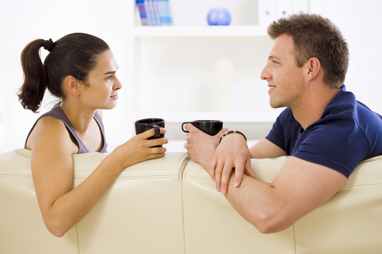 Young couple sitting on sofa